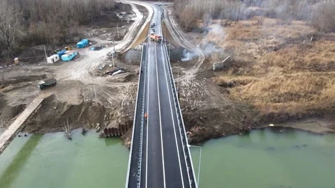 Aerial view of a road bridge under construction. road and bridge under Stock Footage 229900407