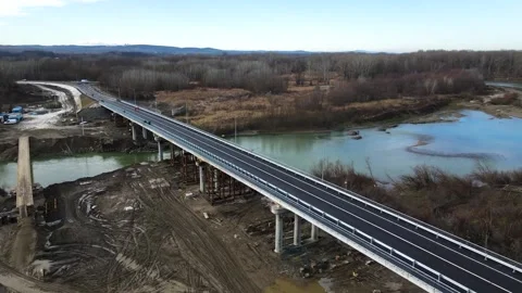 Aerial view of a road bridge under construction. road and bridge under Stock Footage 230529245