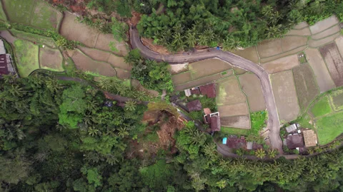 Aerial view of road construction, replacing damaged by landslide section Stock Footage 248507903
