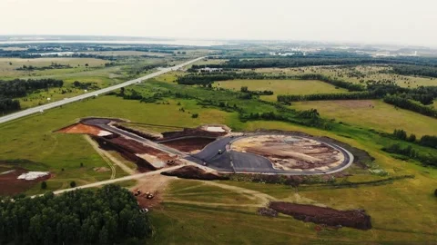 Aerial view of road construction of testing ground for cars. Black asphalt, sand Stock Footage 167154165