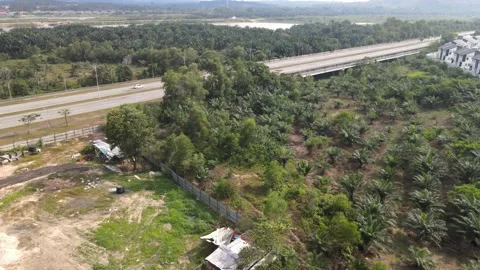 Aerial view of road, forest, field and lake in Putrajaya Stock Footage 149279565