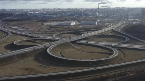 Aerial view road interchange traffic, look as quatrefoil Stock Footage 125797199