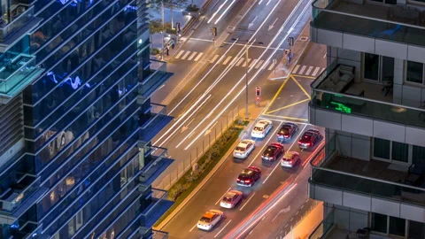 Aerial view of a road intersection in a big city night timelapse. Stock Footage 102553574