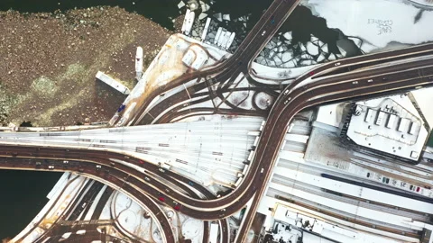 Aerial view of road intersection covered in snow at winter in Stockholm City Stock Footage 149700315