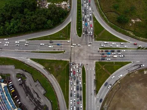 Aerial view of road intersection with crowded vehicles Stock Photos