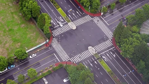 Aerial view of road intersection in midtown of modern city Stock Footage 195966342