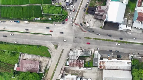 Aerial view of road intersection in Soreang, Indonesia. Stock Footage 347141473
