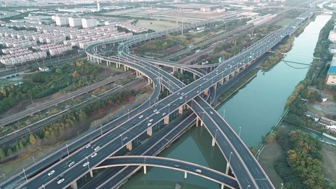 Aerial view of road junction with moving cars. Road interchange or highway Stock-Footage 119826806