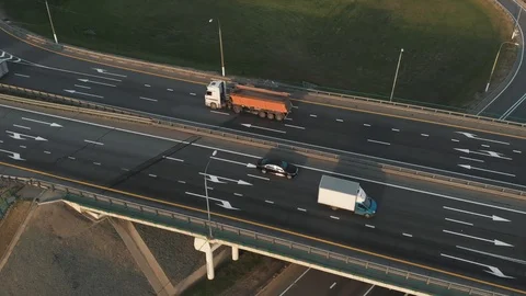 Aerial view of road junction with moving cars. Road interchange. Traffic of Stock Footage 124692054