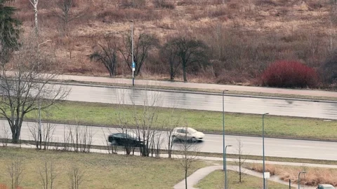 Aerial view of road junction with moving cars. Road interchange or highway Stock Footage 263725584