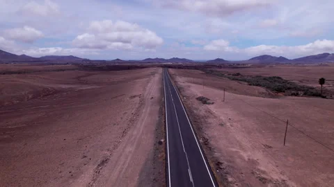 Aerial view of road leading to distant horizon Stock Footage 310396590