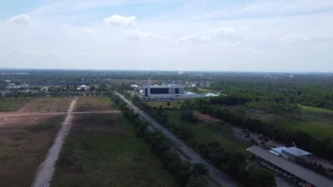 Aerial view of the road leading to the Sultan Agung Islamic Hospital, Banja.. Stock Footage 284925874