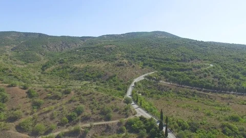 Aerial view on road in mountains Stock Footage 80986523