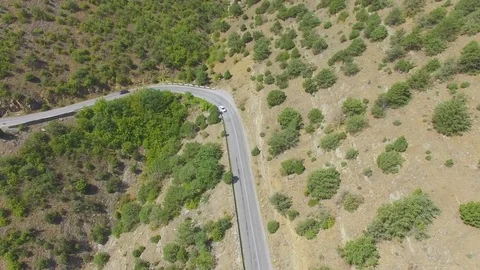 Aerial view on road in mountains Stock Footage 80986930