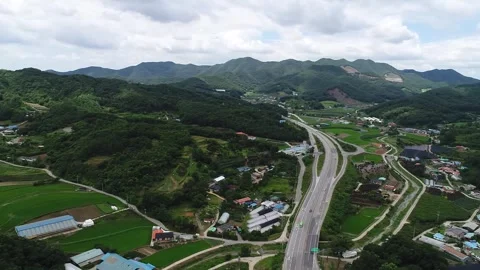 Aerial view of the road to the mountains Video stock 310930591