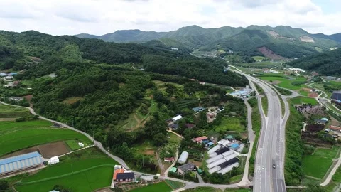 Aerial view of the road to the mountains Video stock 310930593
