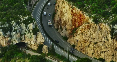 Aerial view of the road running between Monaco and the surrounding towns through Stock Footage 310200837