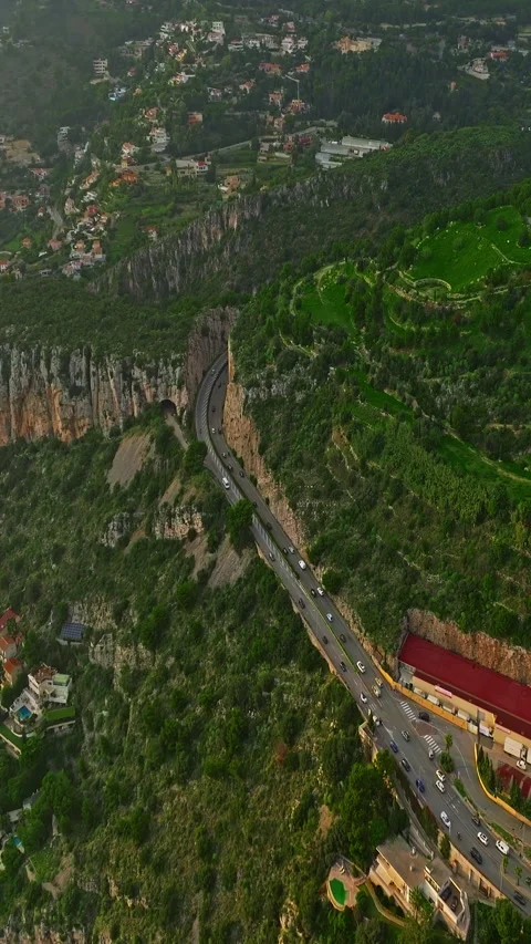 Aerial view of the road running between Monaco and the surrounding towns Stock Footage 320424141
