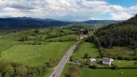 Aerial view of the road through the fields and forests. Stock Footage 106955092