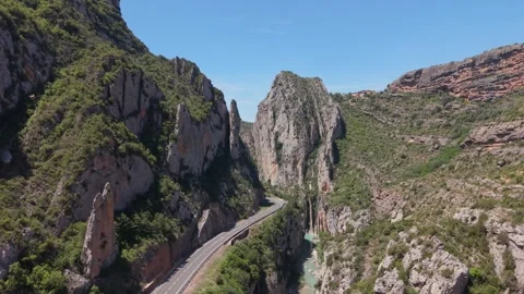 Aerial view of a road through a gorge of rock pillars Video stock 343324587