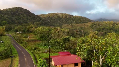Aerial view of roads between the mountains of the Gnobe Bugle region in Stock Footage 343892311