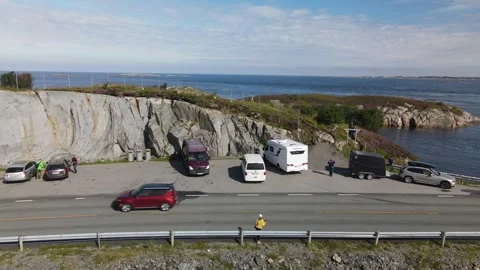 Aerial view of a roadside parking area on the Norwegian coast Stock Footage 345167980