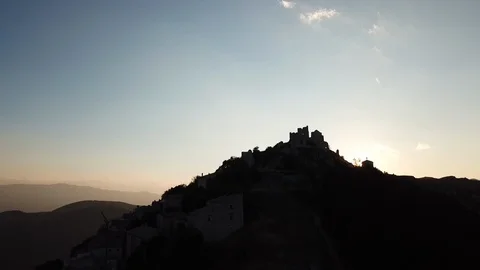 Aerial view of Rocca Calascio ancient fortress in a beautiful day at sunset Stock Footage