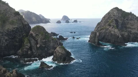 AERIAL VIEW ROCK BEACH WODERFULL ISLAND IN INDONESIA Stock Footage 232452662