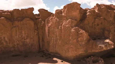 Aerial view of a rock face in the desert of the Bolivian highlands. Stock Footage 274450718
