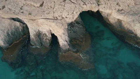 Aerial view of rock formations and beautiful blue sea in Ayia Napa, Cyprus. Stock Footage 84835807