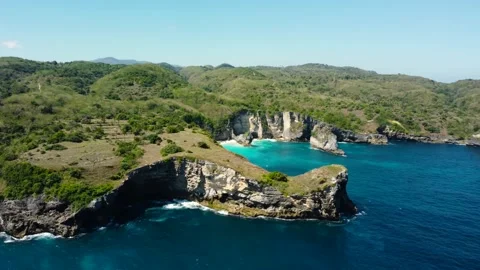Aerial view on rock ledge cliff in ocean Stock Footage 163366338
