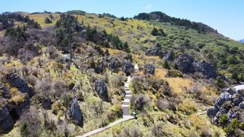 Aerial View of Rock Slope Grass Mountain Mountain Trail in Shennongjia Hubei Stock Footage 337938363