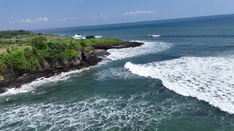 Aerial view of rocks on the Beach Love in Bali, Indonesia Stock Footage 320516159