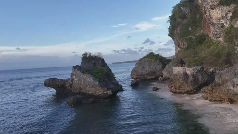 Aerial view of rocks on the coast on Thomas beach, Bali, Indonesia Stock Footage 284397892