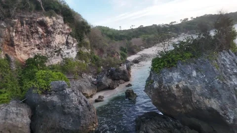 Aerial view of rocks on the coast on Thomas beach, Bali, Indonesia Stock Footage 284789065