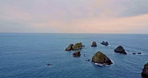 Aerial view of Rocks Nugget Point vertical Stock Footage 73128103