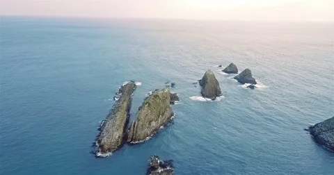 Aerial view of Rocks Nugget Point vertical Stock-Footage 73128377