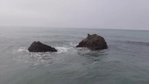Aerial view of rocks in the ocean Stock Footage 79862231