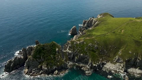 Aerial view, Rocks, Pacific Ocean, Grassland on the mountains Stock Footage 162638486