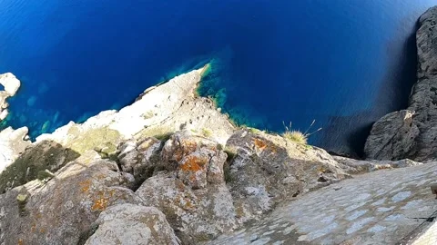 Aerial view of rocks by the sea. Panoramic of the seabed turquoise water Stock Footage 198509288