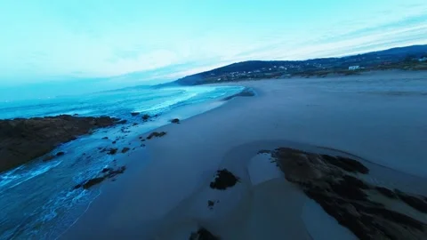 Aerial View Rocks On A Very Long Beach With Big Foamy Waves At Sunset Stock Footage 333201206