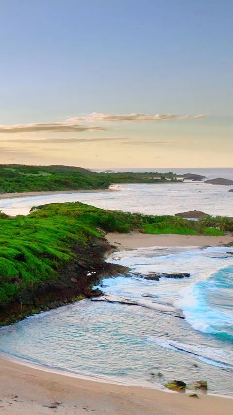 Aerial view of rocky bay and sandy beach Vertical video. Stock Footage 331311368