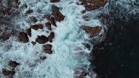 Aerial View of a Rocky Cliff Edge Overlooking the Atlantic Ocean Vídeos de archivo 345841104