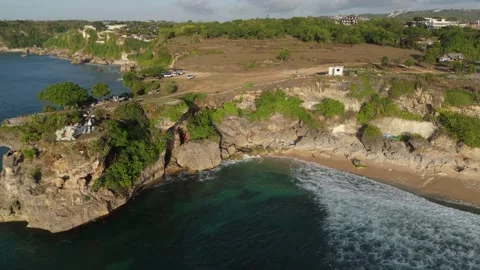 Aerial View of Rocky Cliffs and Hidden Cove at Balangan Beach, Bali Video stock 337607119