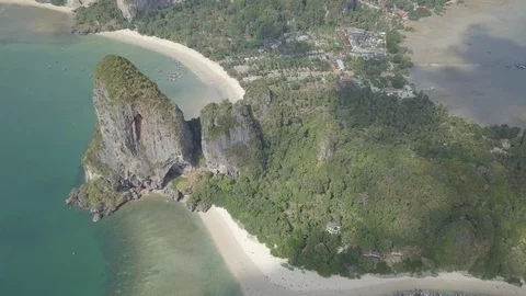 Aerial view of rocky cliffs, floating boats on Phra Nang beach, Krabi, Thailand. Stock Footage 121453921