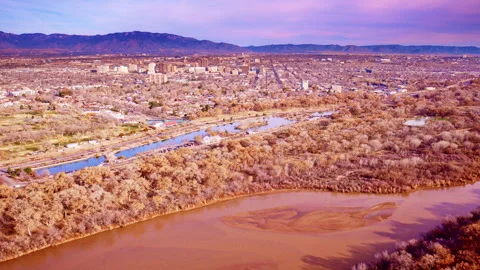 Aerial view of rocky desert cliffs with deep red hues Video stock 334708495
