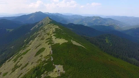 Aerial view of rocky mountain range Stock Footage 79715032