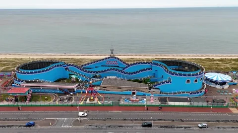 Aerial view of roller coaster in Great Yarmouth town, Norfolk, United Kingdom Stock Footage 337646751