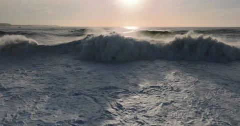Aerial view of rolling and breaking big powerful waves in the Atlantic ocean Stock Footage 223008121