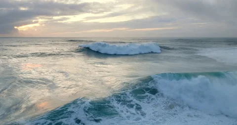 Aerial view of rolling and breaking big powerful waves in the Atlantic ocean Stock Footage 224736170